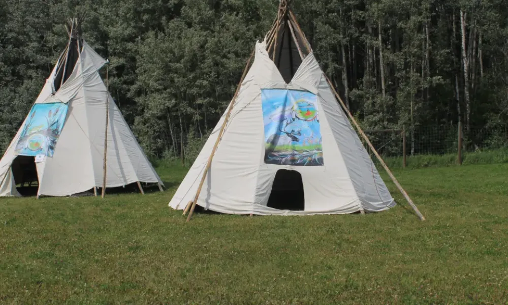 Tents with art over entrance