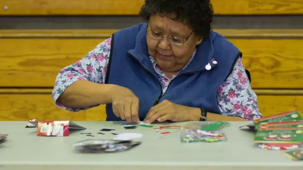 Elderly person making crafts