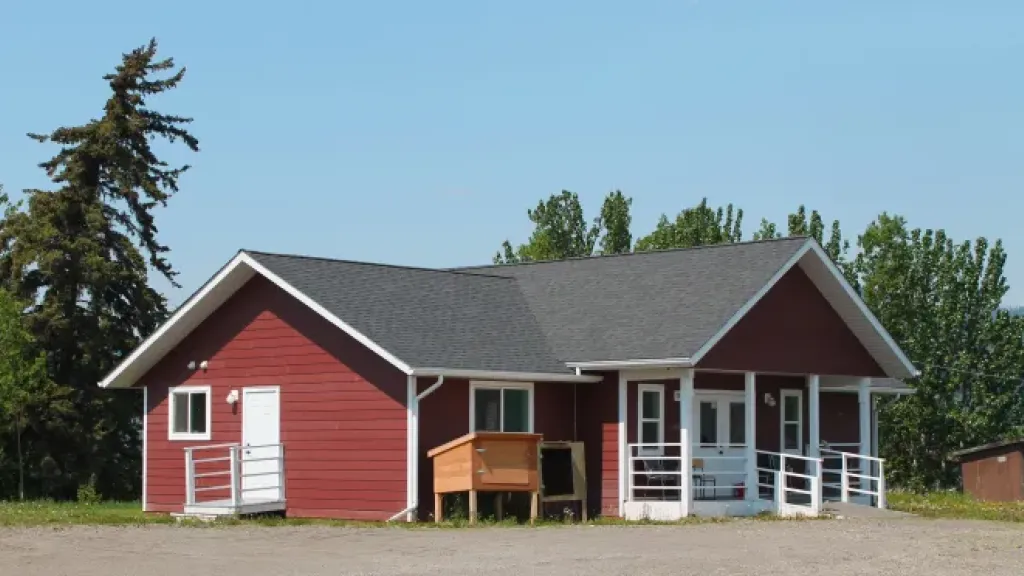 Exterior of red wooden building